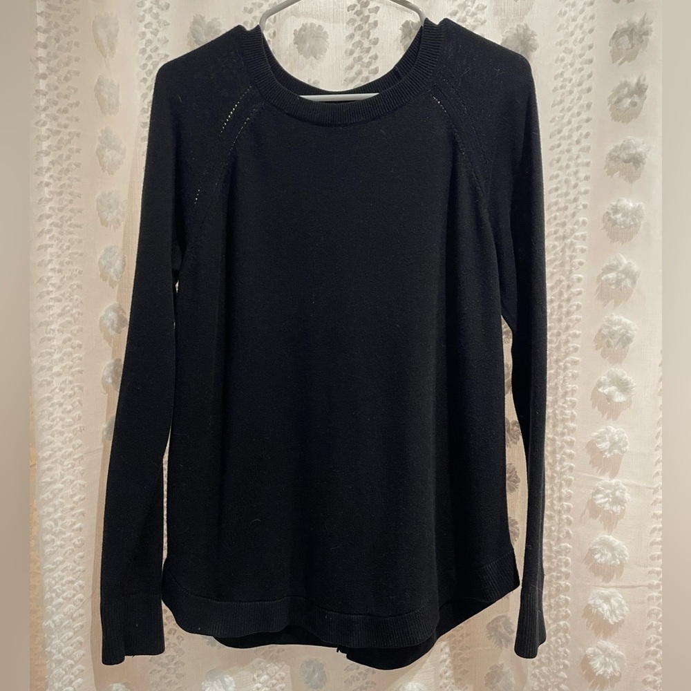 Lululemon soft sweater. Slots in back. Like new condition. Size 6
